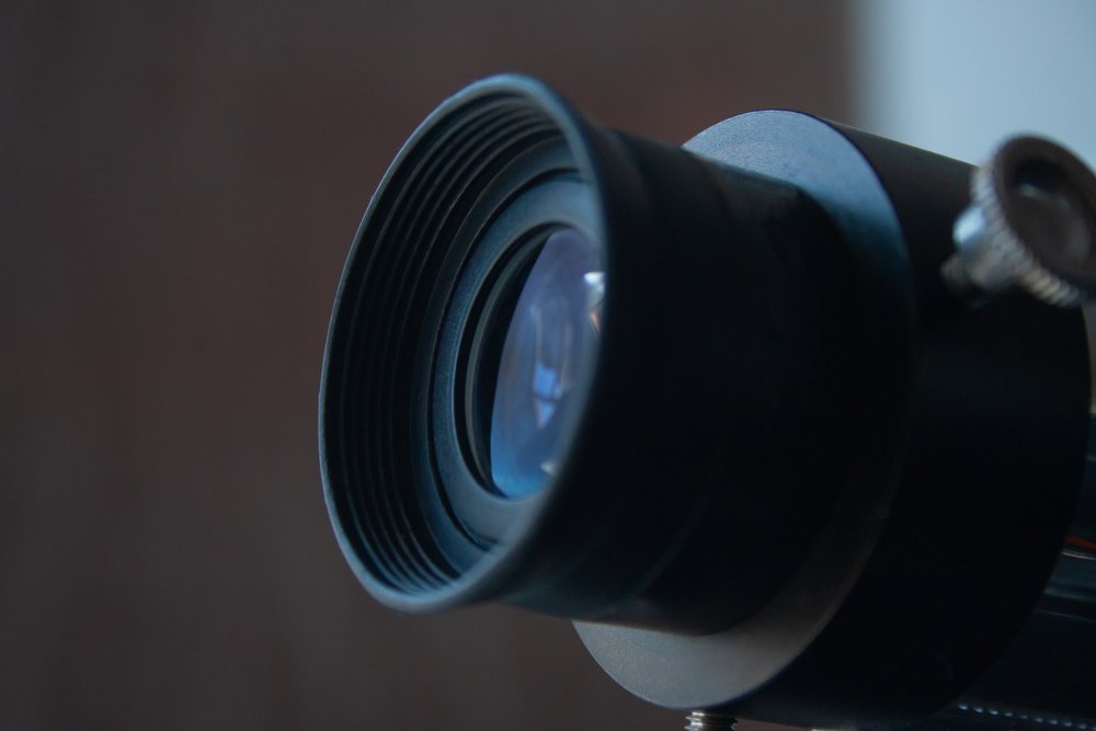 A close up of an Eyepiece of a scope
