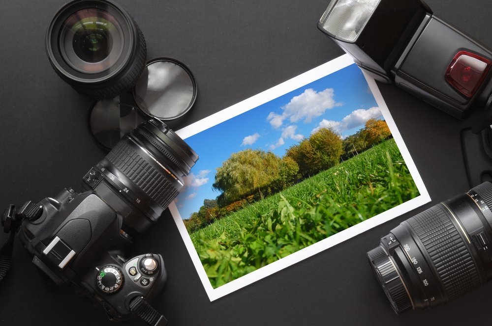 dslr camera lens and image on black background